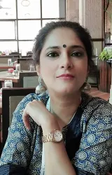 Неелу Догра